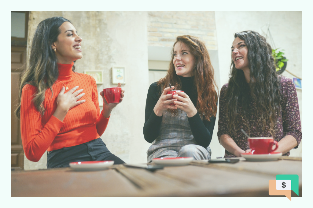 Three women drinking tea and conversing.